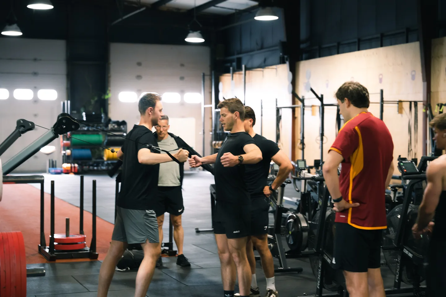 Training group gathered on the gym floor